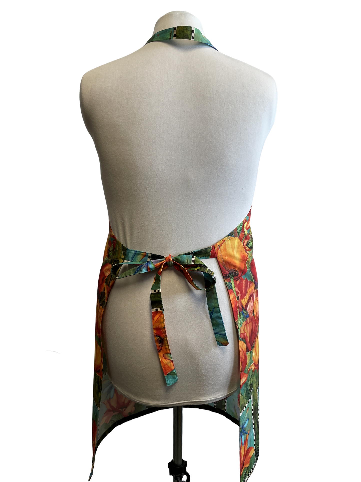 Tablier en coton avec motif de fleurs de pavot.