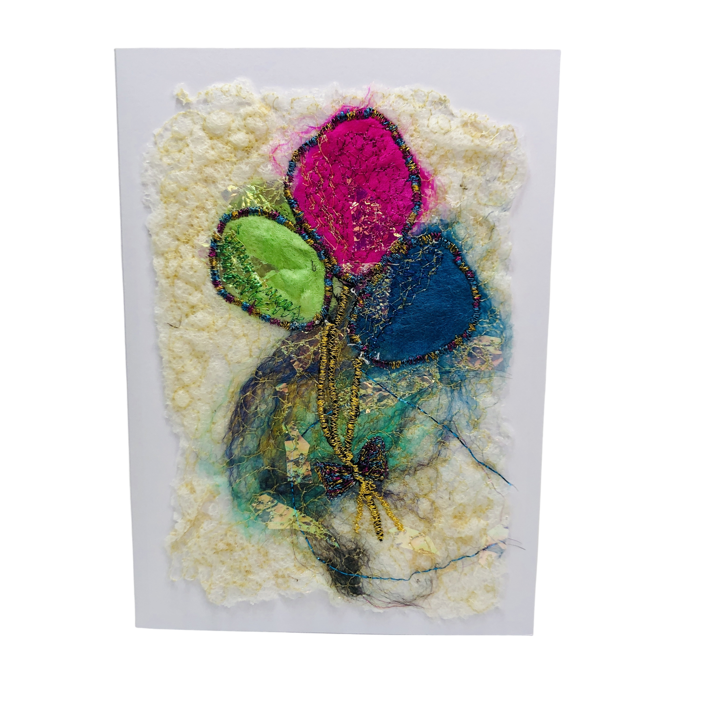 Carte de vœux avec jolis ballons verts, roses et bleus brodée sur la laine