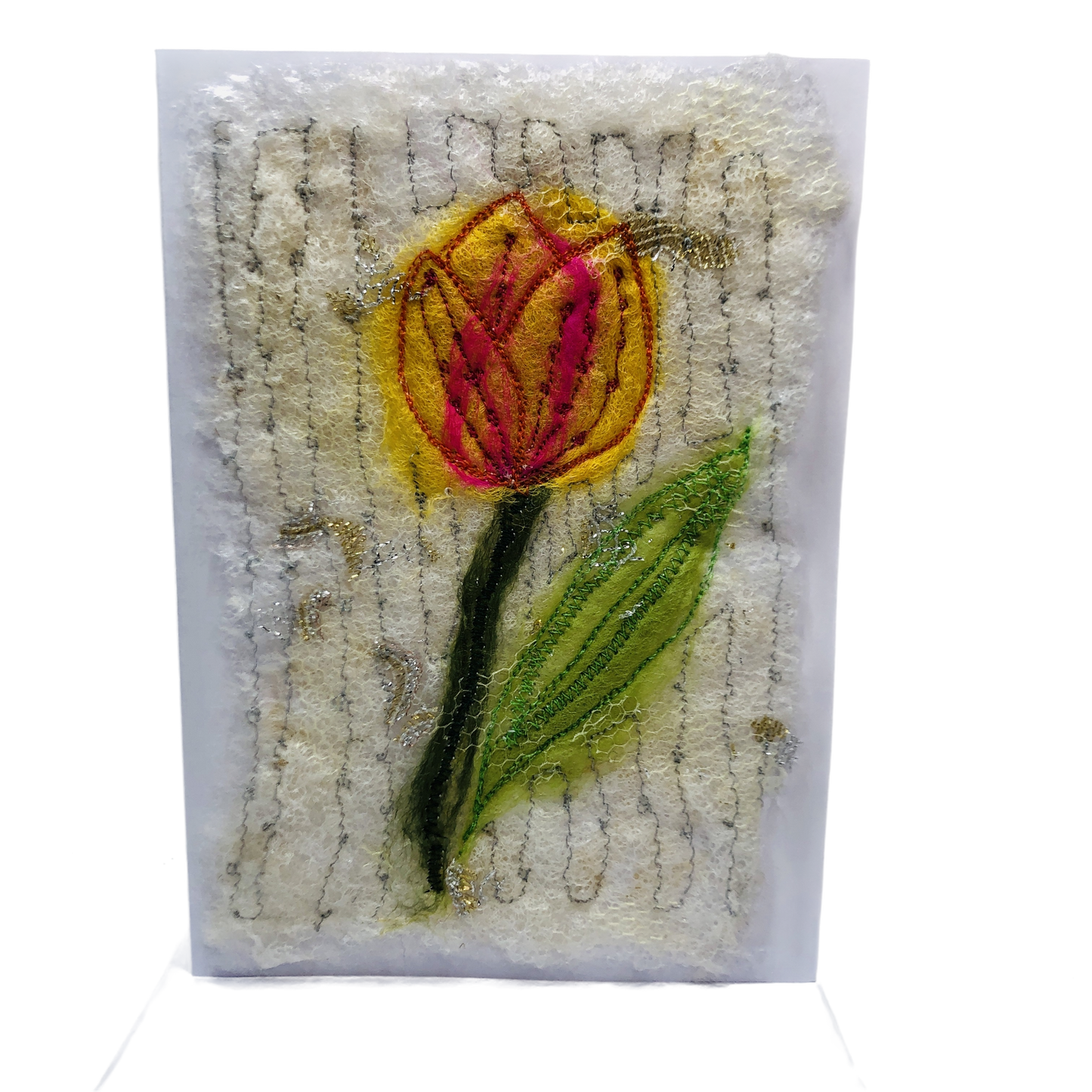 Carte de vœux avec une tulipe jaune-orange brodée sur la laine