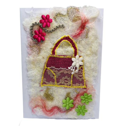 Carte de vœux avec un joli sac à main en jute rose brodée sur la laine
